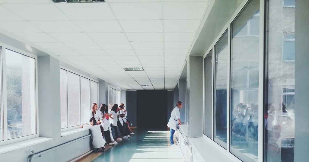 Doctors in hospital hallway where LEP patients are seen