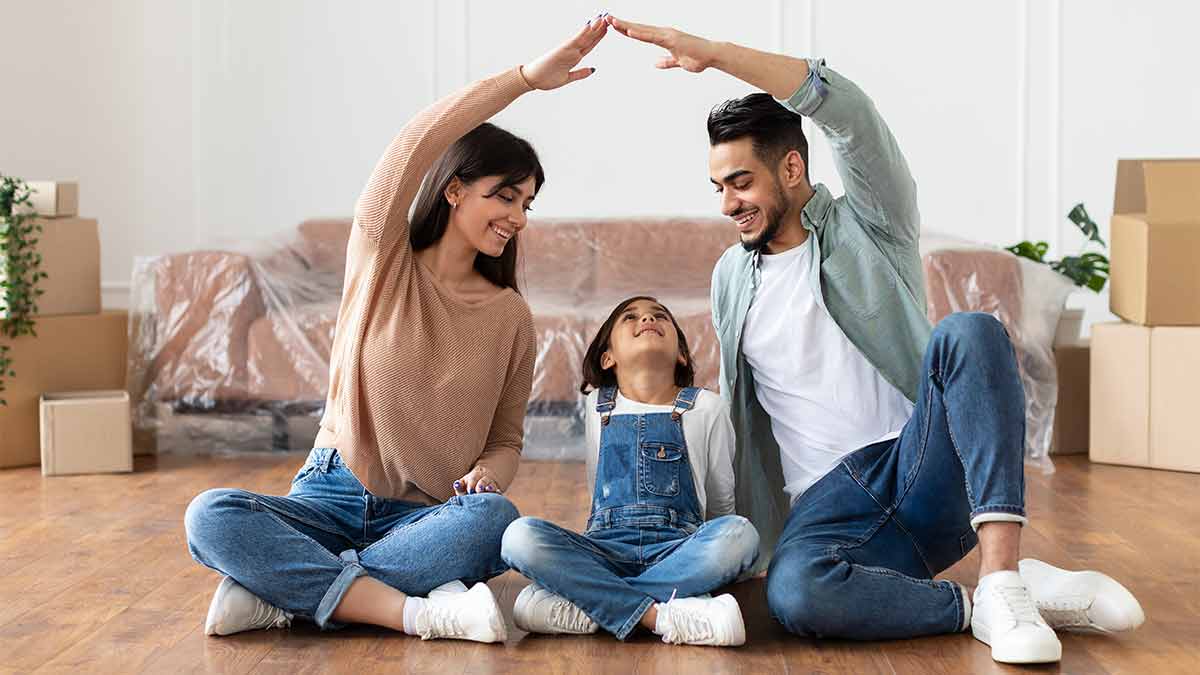 A family of four move into their new house after an interpreter helped them understand their mortgage.