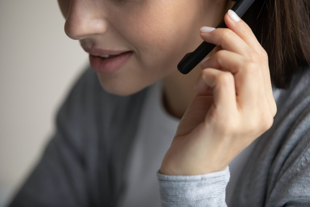 Professional phone interpreter taking a client call