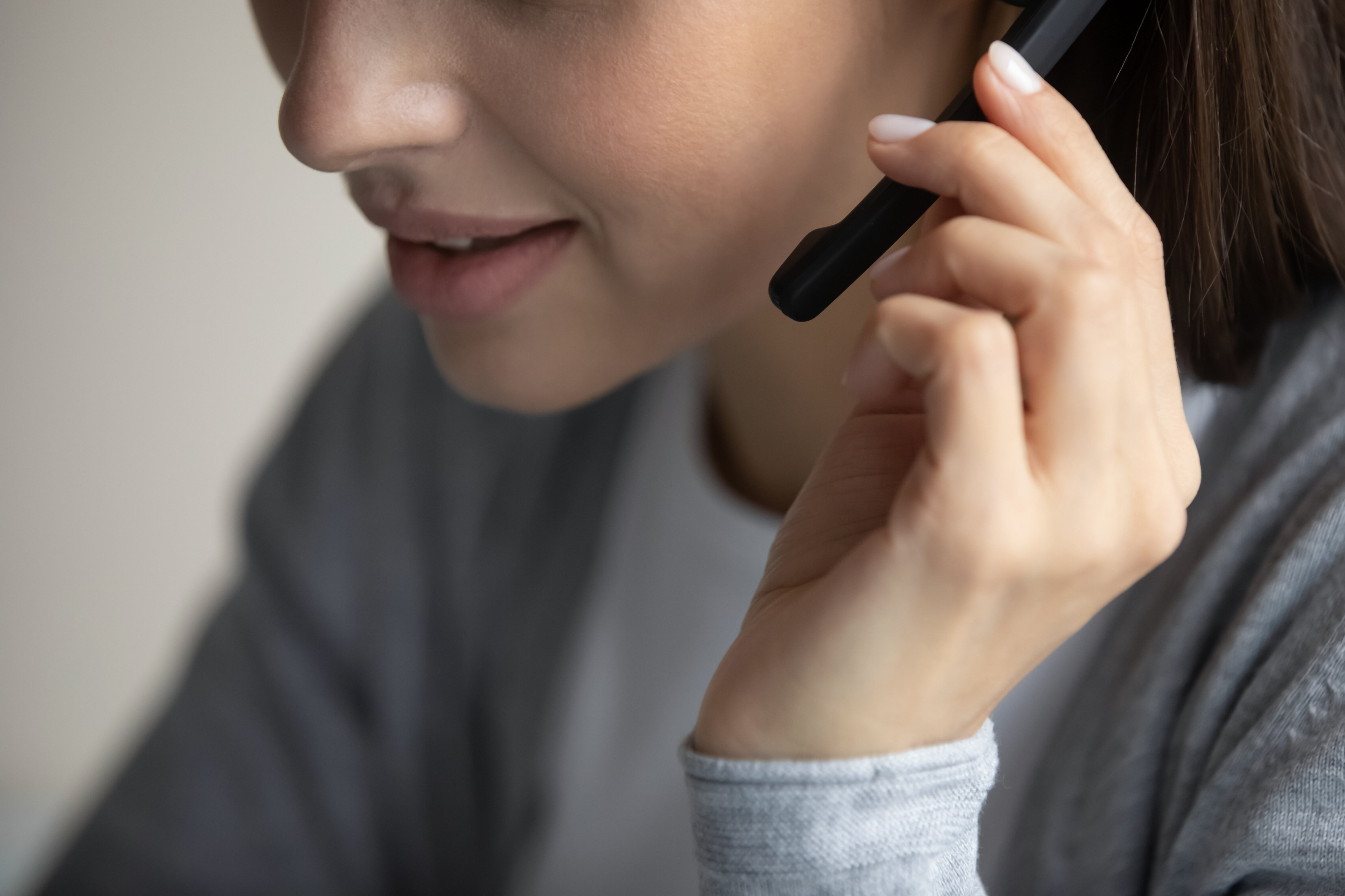 Professional phone interpreter taking a client call