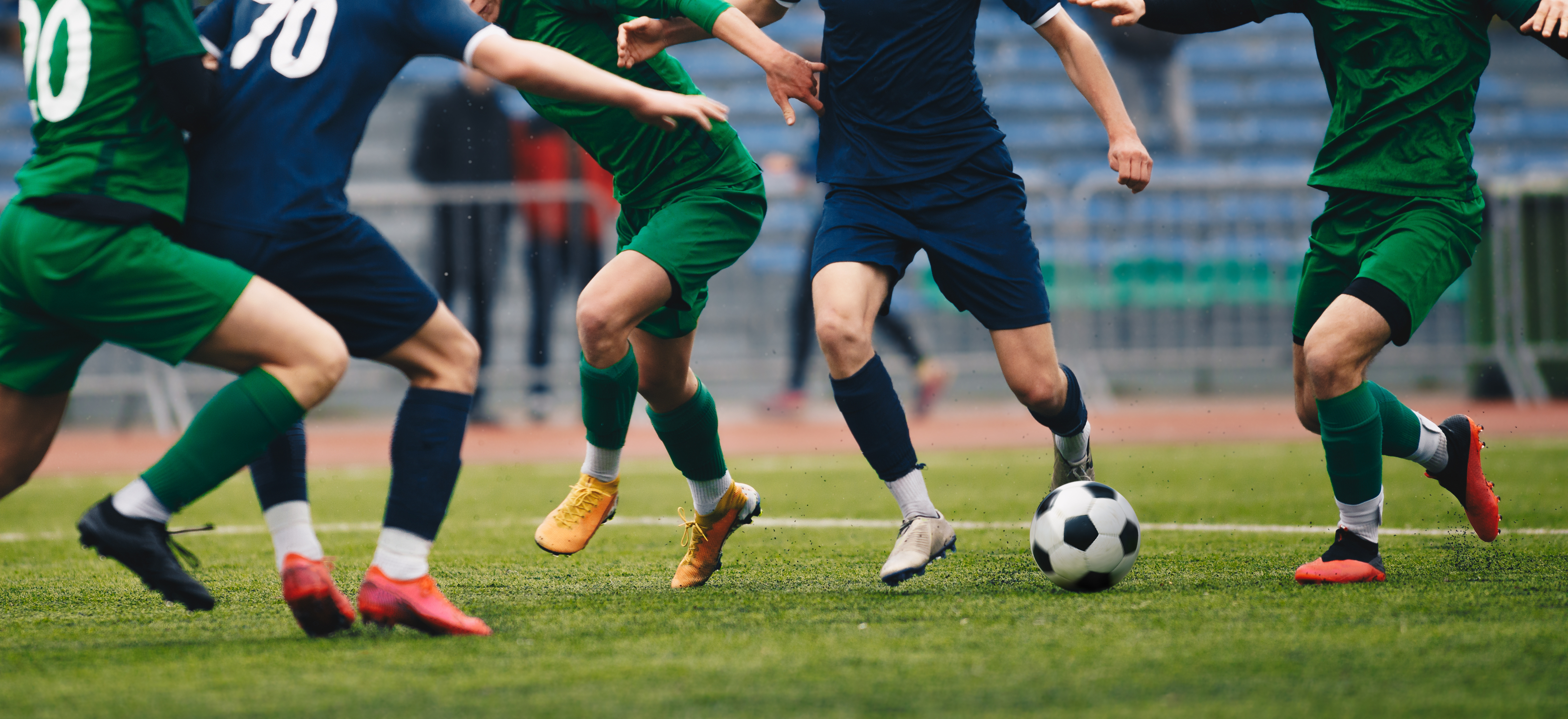 Two professional international soccer teams play each other at the FIFA World Cup